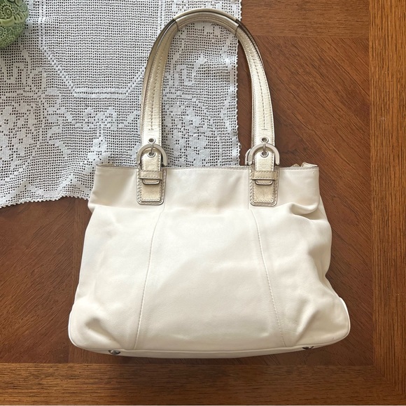 Coach Handbags - Coach cream and metallic gold lovely leather shoulder bag with lavender …